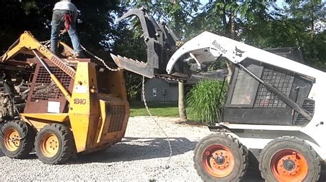 skid steer tipping backwards